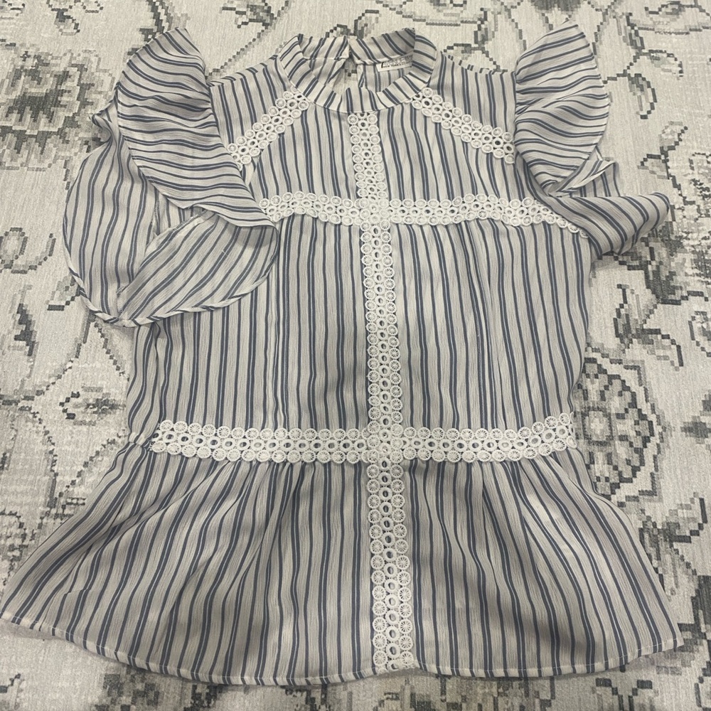 Elegant Striped Blouse with Ruffle Sleeves